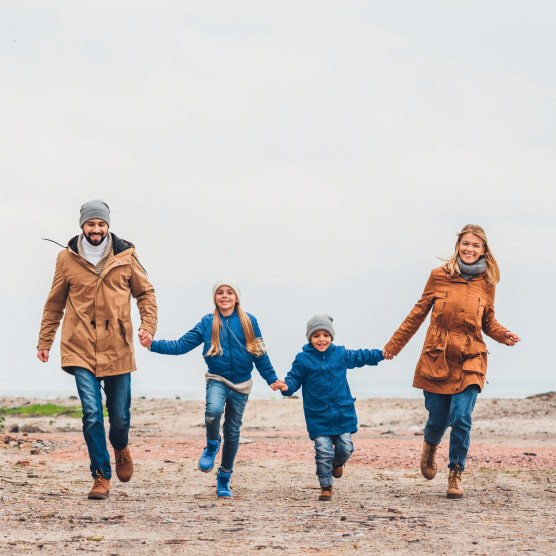 All the familiy walking on cold day.